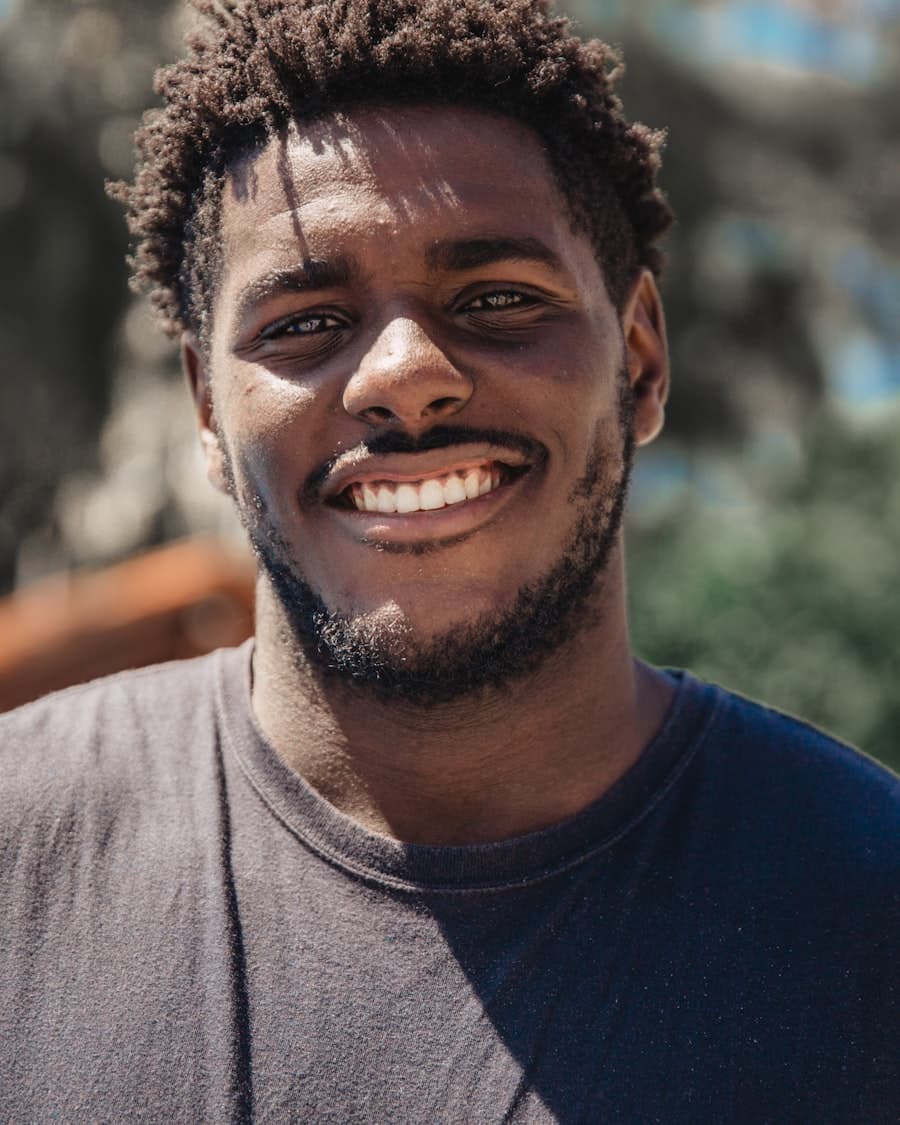 Black man with a confident, focused smile